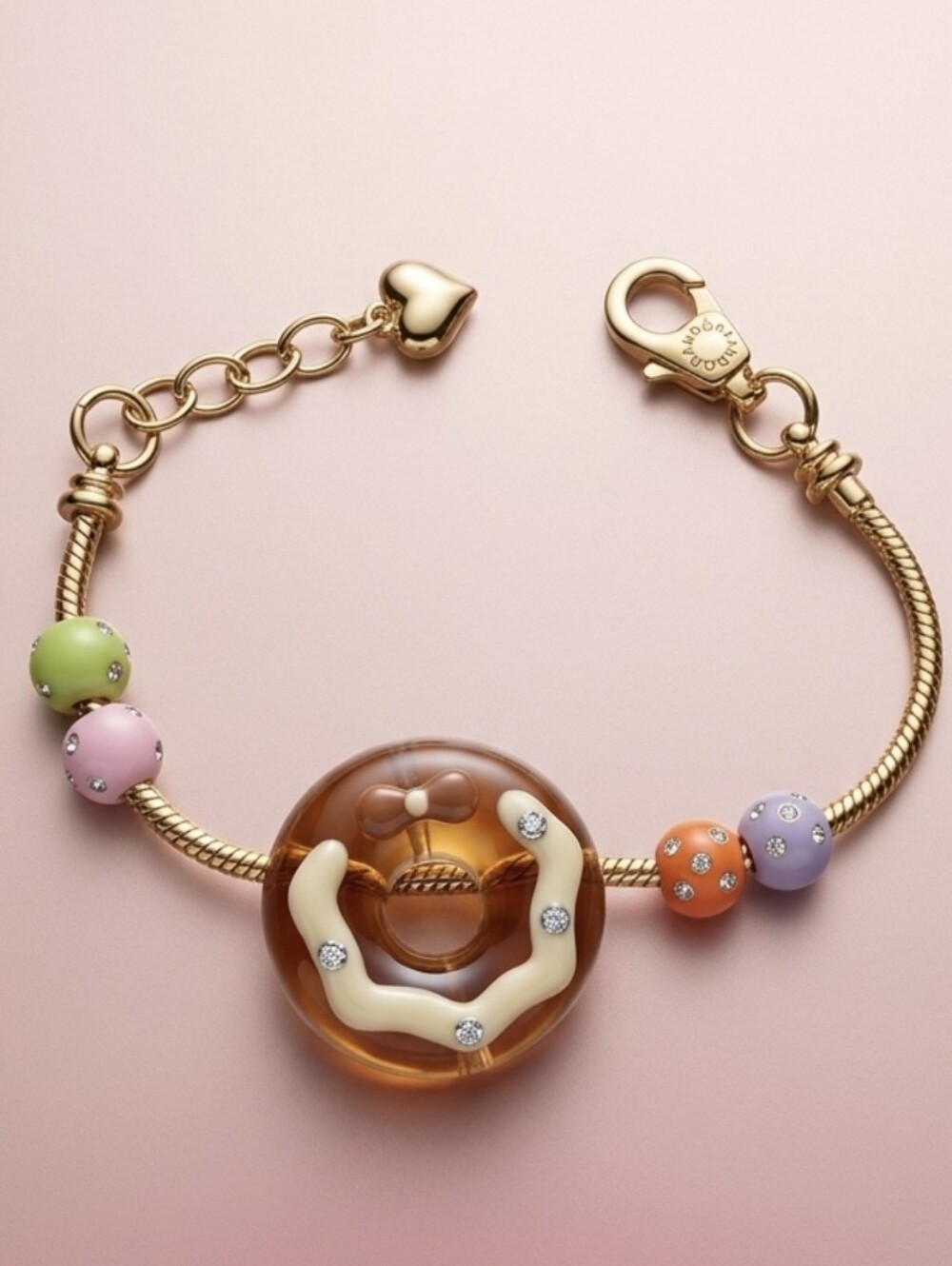 Gold Toned Charm Bracelet with Donut Charm and Pastel Beads